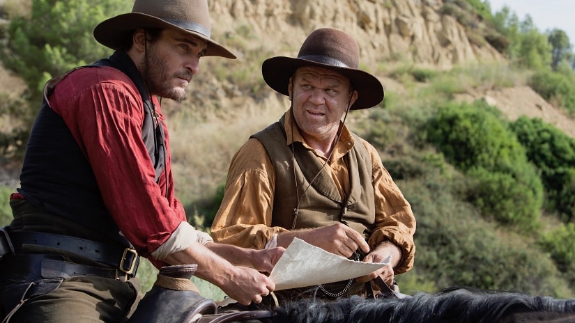 Joaquin Phoenix and John C Reilly in The Sisters Brothers. Image via Twitter